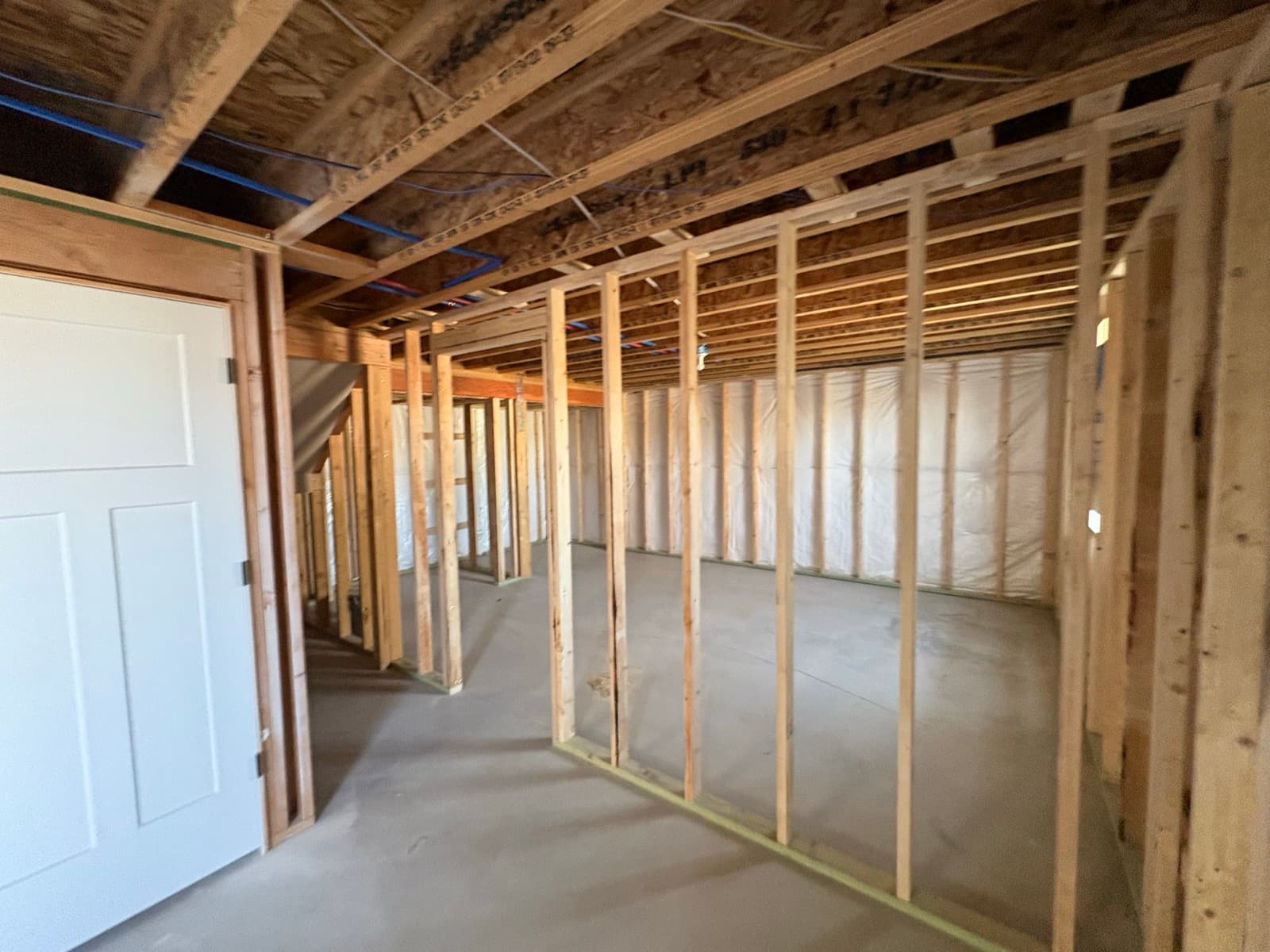 New basement partition walls framed and ready for drywall