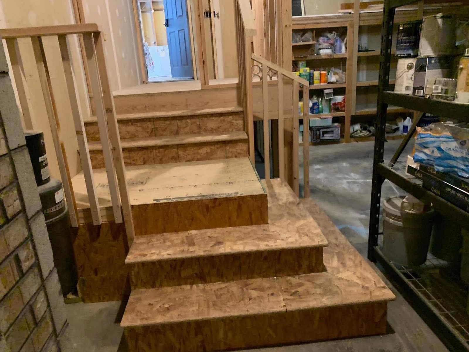 Custom basement stairs with new railing and trim