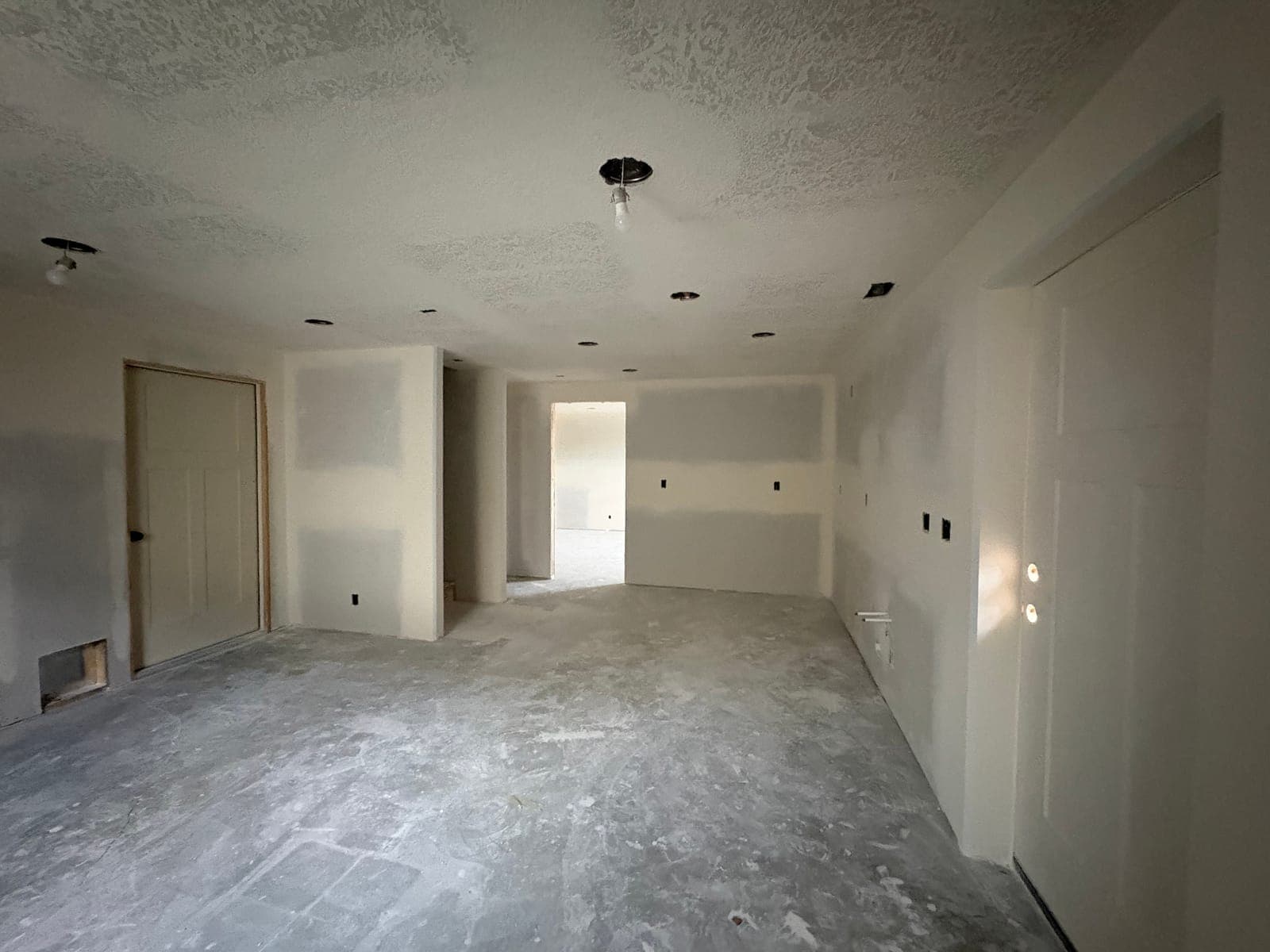 Family room taped, mudded, and ceiling textured, ready for primer