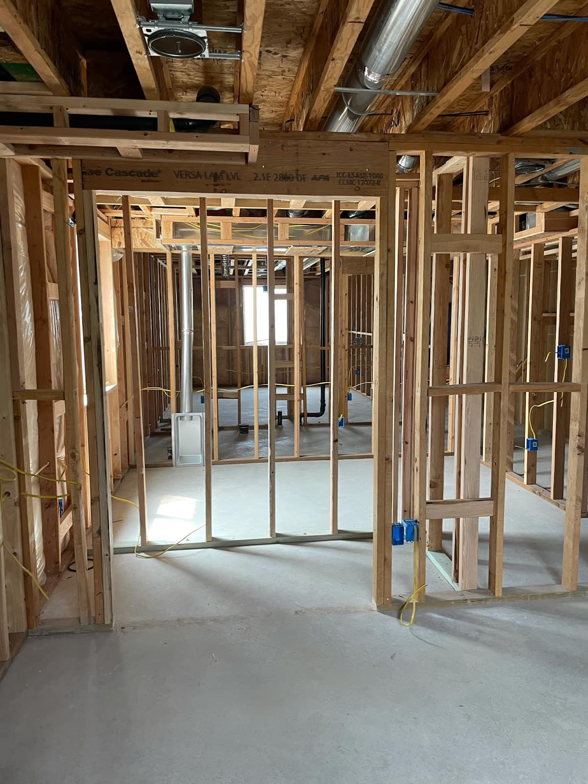 Interior basement walls framed for new rooms