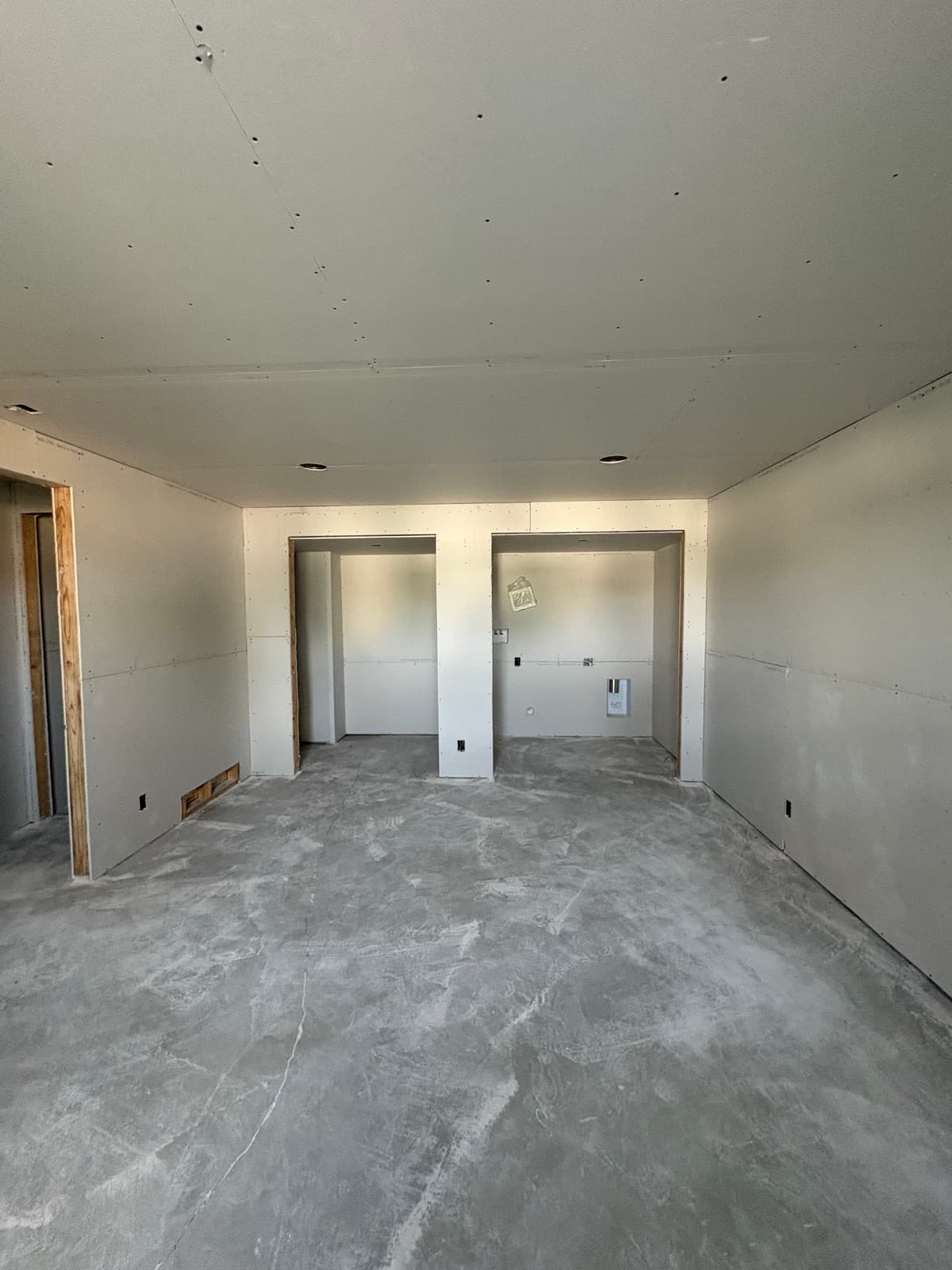 Basement bedroom closets drywalled by JS ProFinish in Clinton, Davis County